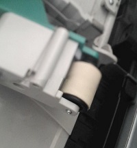 Warum funktioniert der Druck beim CX1000e nicht auf Glossy Material und wird immer abgeschnitten?
